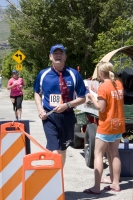 Finance professor Phil Bryson running to meet up with teammates